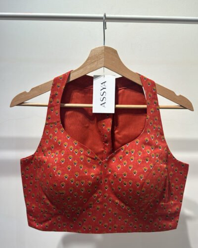 HALTER SLEEVELES- ORANGE PRINTED.