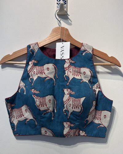SIZE 34 COW PRINT T BACK
